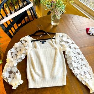 French connection, floral and whimsical sweater with a square neck. Size L